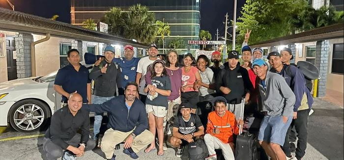 Volunteers and residents pose together